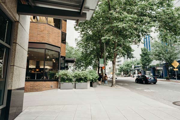 The street and sidewalk outside the Summit Dental Care building