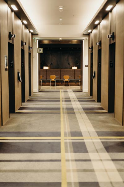 Hallway of elevators in the Summit Dental Care building